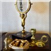 DM07.  Brass mirror and décor. 